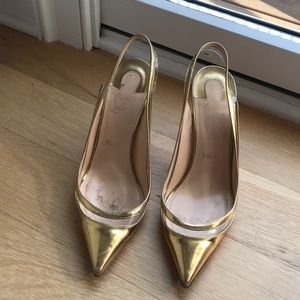 100% authentic Christian Louboutin gold pumps